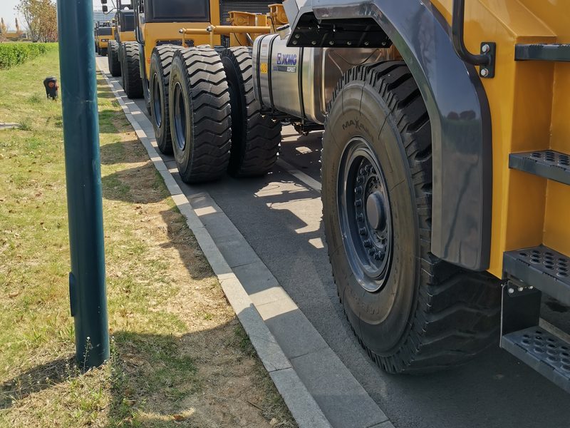 Mining dump truck with industrial TPMS sensors for high-temperature tire monitoring